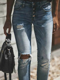 Distressed Button-Fly Skinny Jeans.