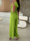 Surplice Wide Leg Belted Jumpsuit.