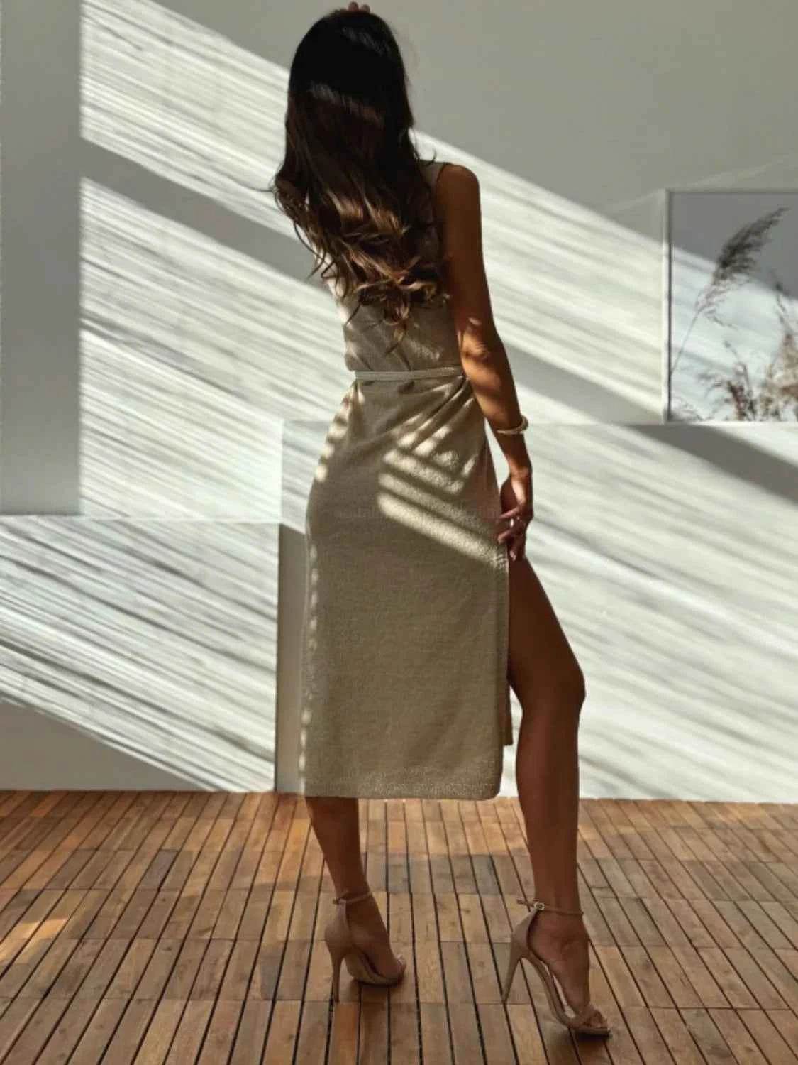 Slit V-Neck Sleeveless Sweater Dress.