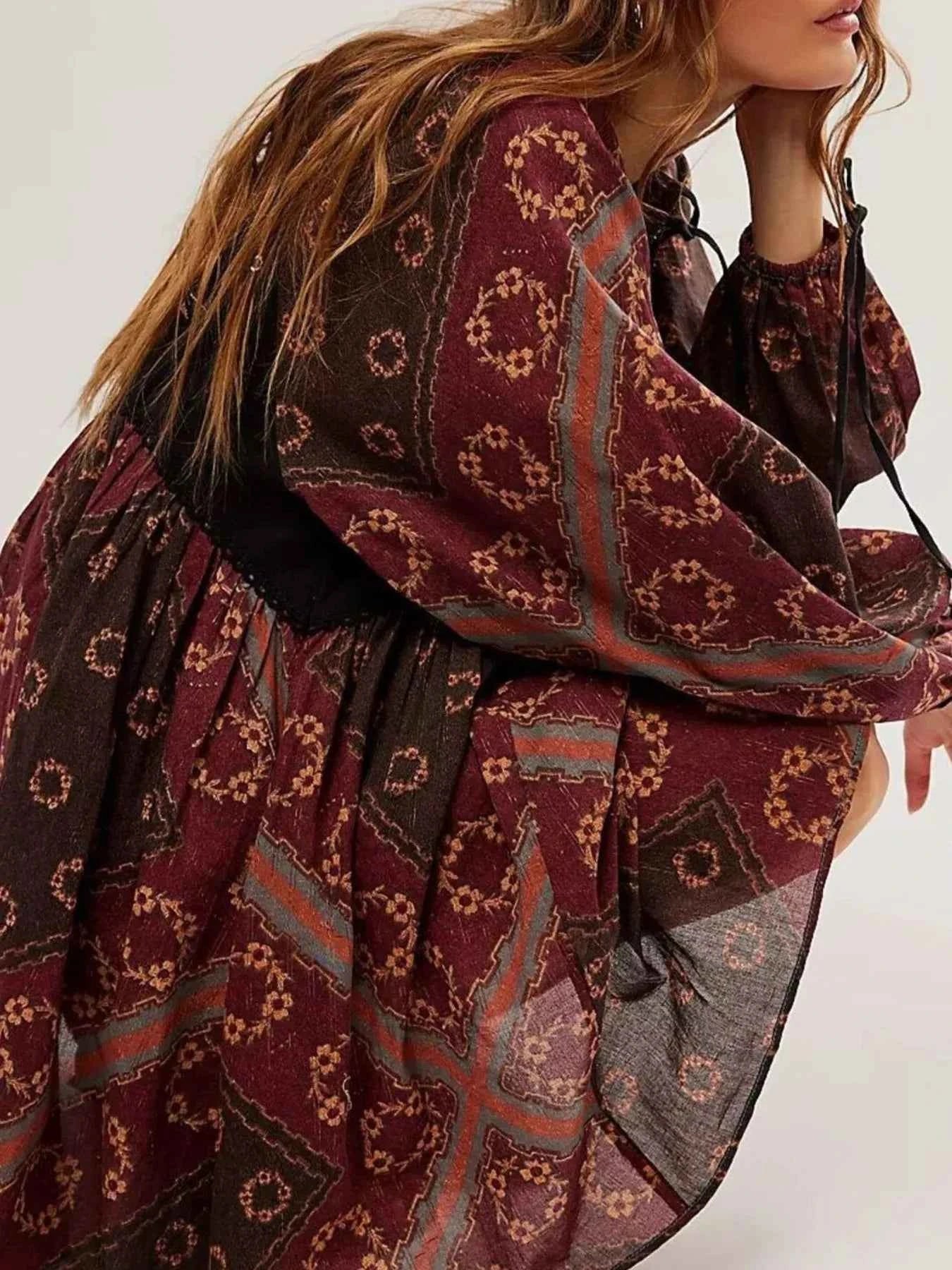 Printed Tie Neck Long Sleeve Dress.