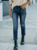 Distressed High Waist Jeans.