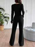 Tie Front Long Sleeve Flare Jumpsuit.