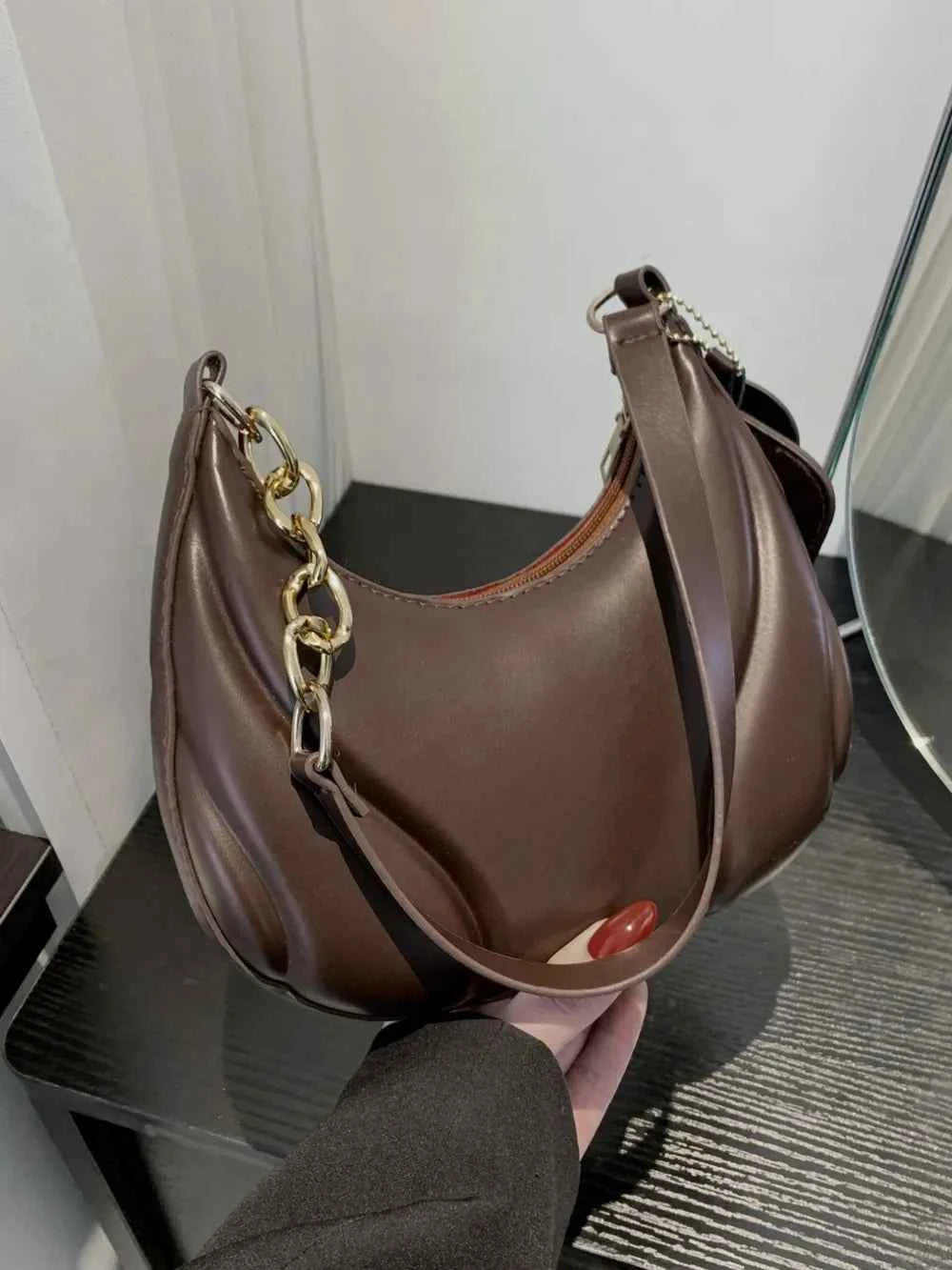 PU Leather Medium Shoulder Bag with EarPods Compartment.