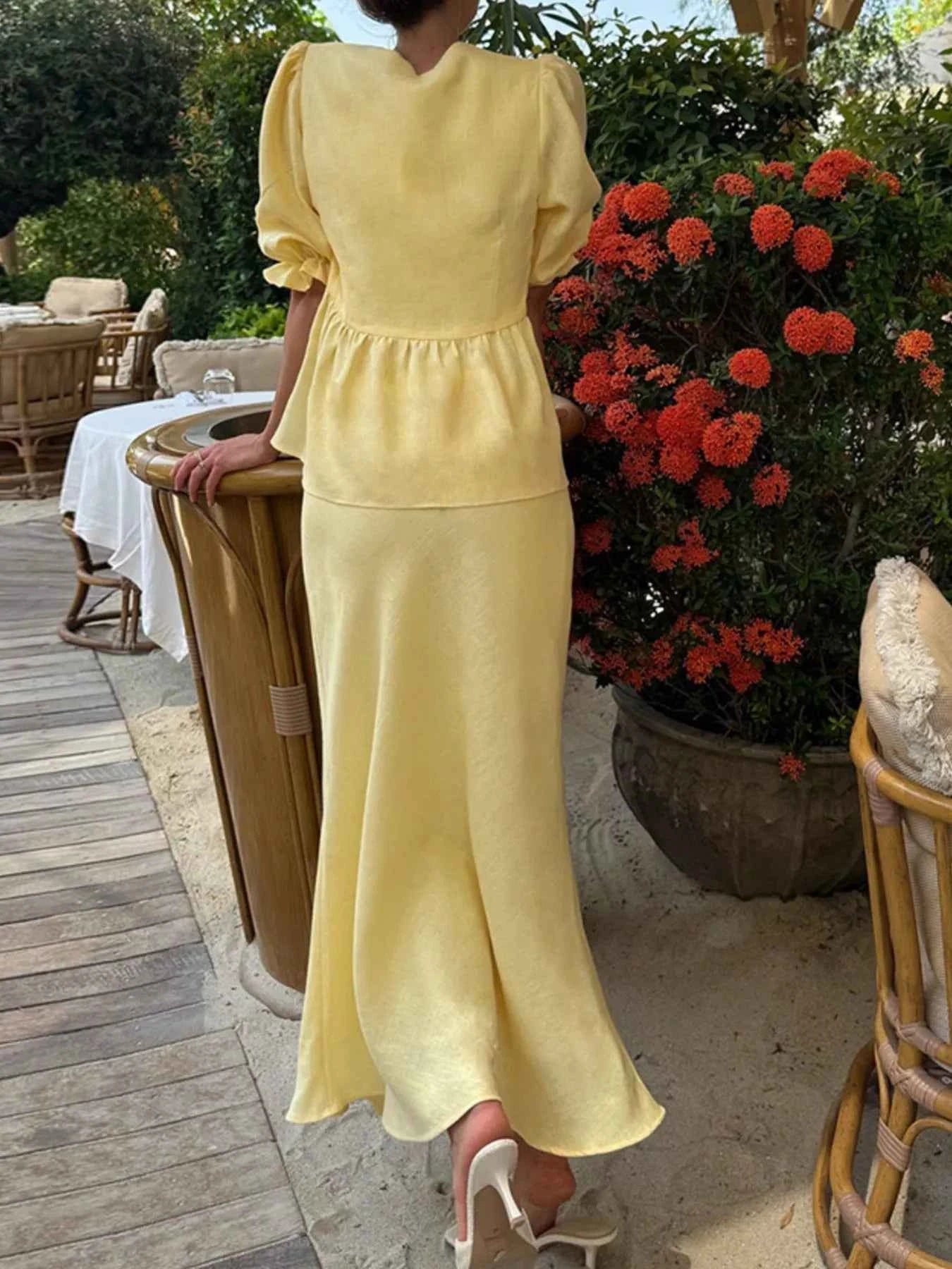 Lace-Up Tie Front Peplum Top and Skirt Set.