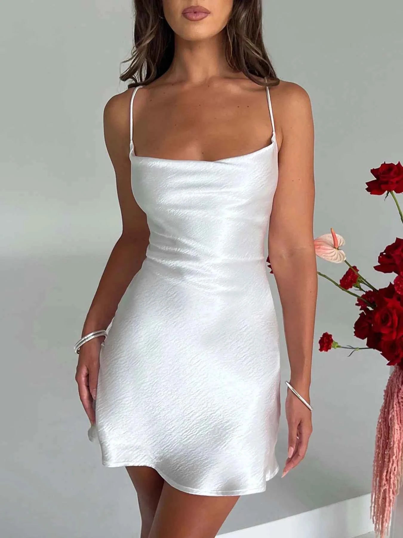 Crisscross Tie Back Mini Cami Dress.