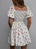 Puff Sleeve Cherry Print Smocked Mini Dress.