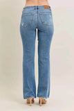Judy Blue Plus Size Mid Rise Bootcut Jeans with Destroyed Hem.