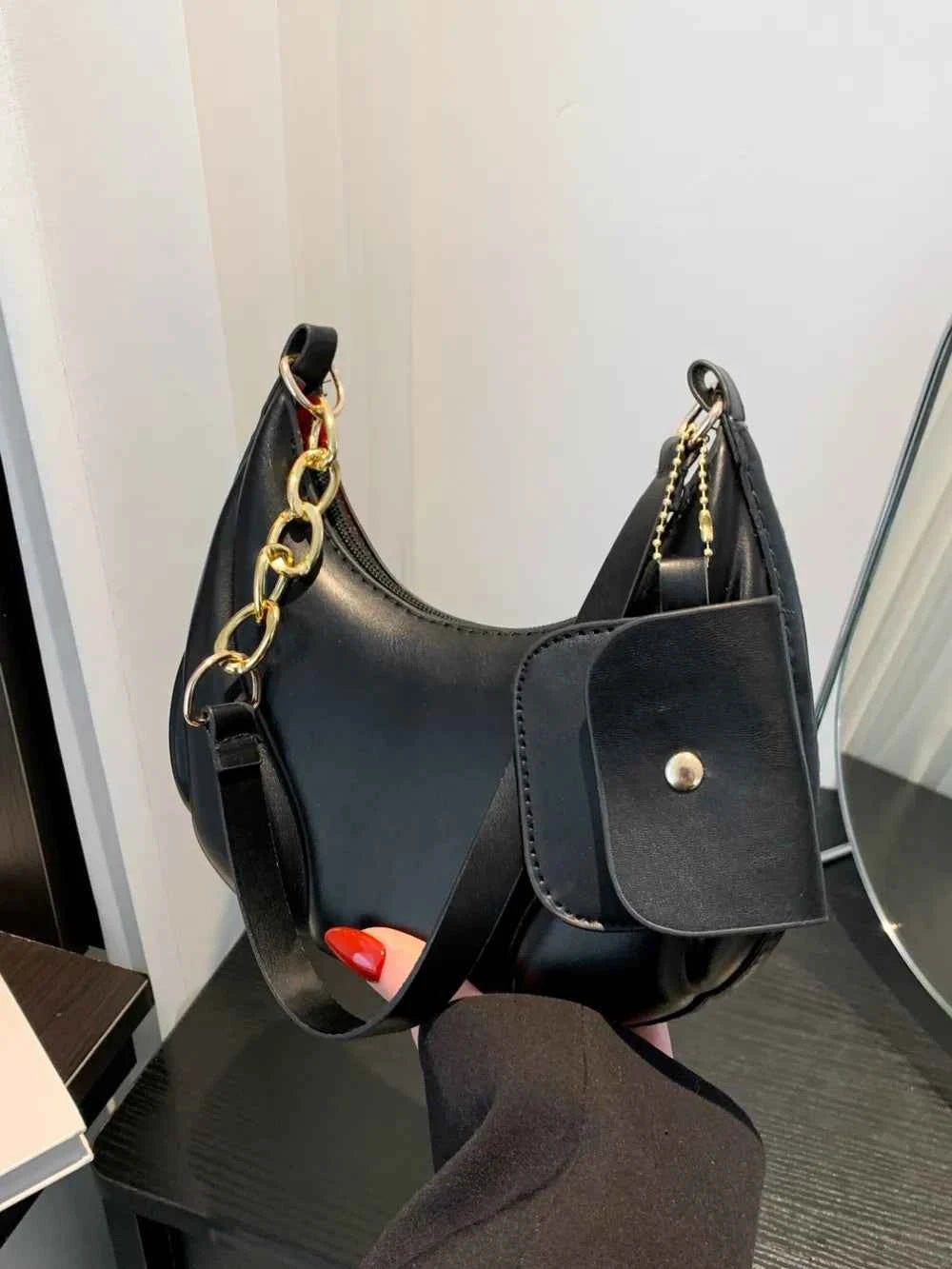 PU Leather Medium Shoulder Bag with EarPods Compartment.