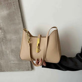 Small Leather Shoulder Bag with Gold Accent.