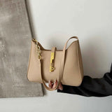 Small Leather Shoulder Bag with Gold Accent.