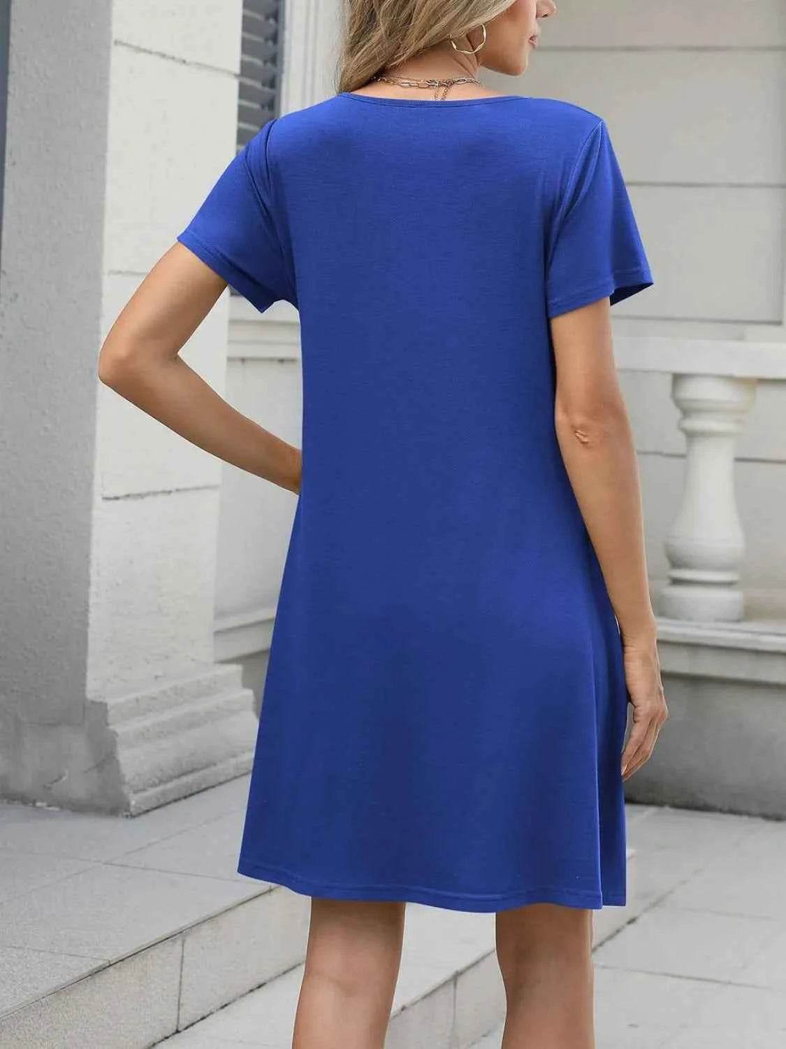 Pleated Front Round Neck Swing Dress.