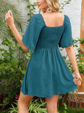 Smocked Flutter Sleeve Dress with Knotted Back Design - EBYNN