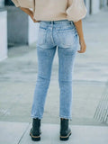 Distressed High Waist Jeans.