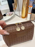 PU Leather Woven Clutch Bag.