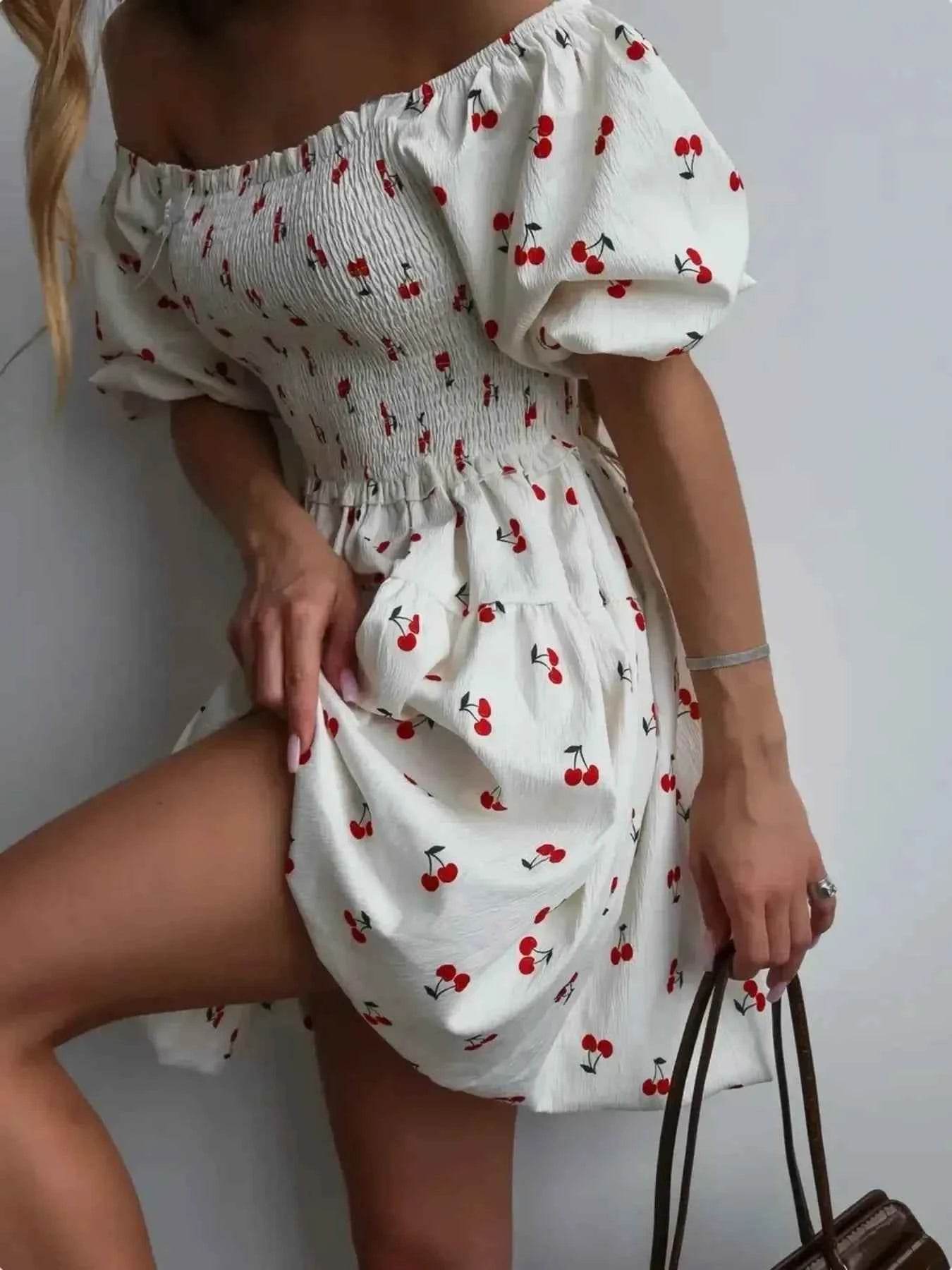 Puff Sleeve Cherry Print Smocked Mini Dress.