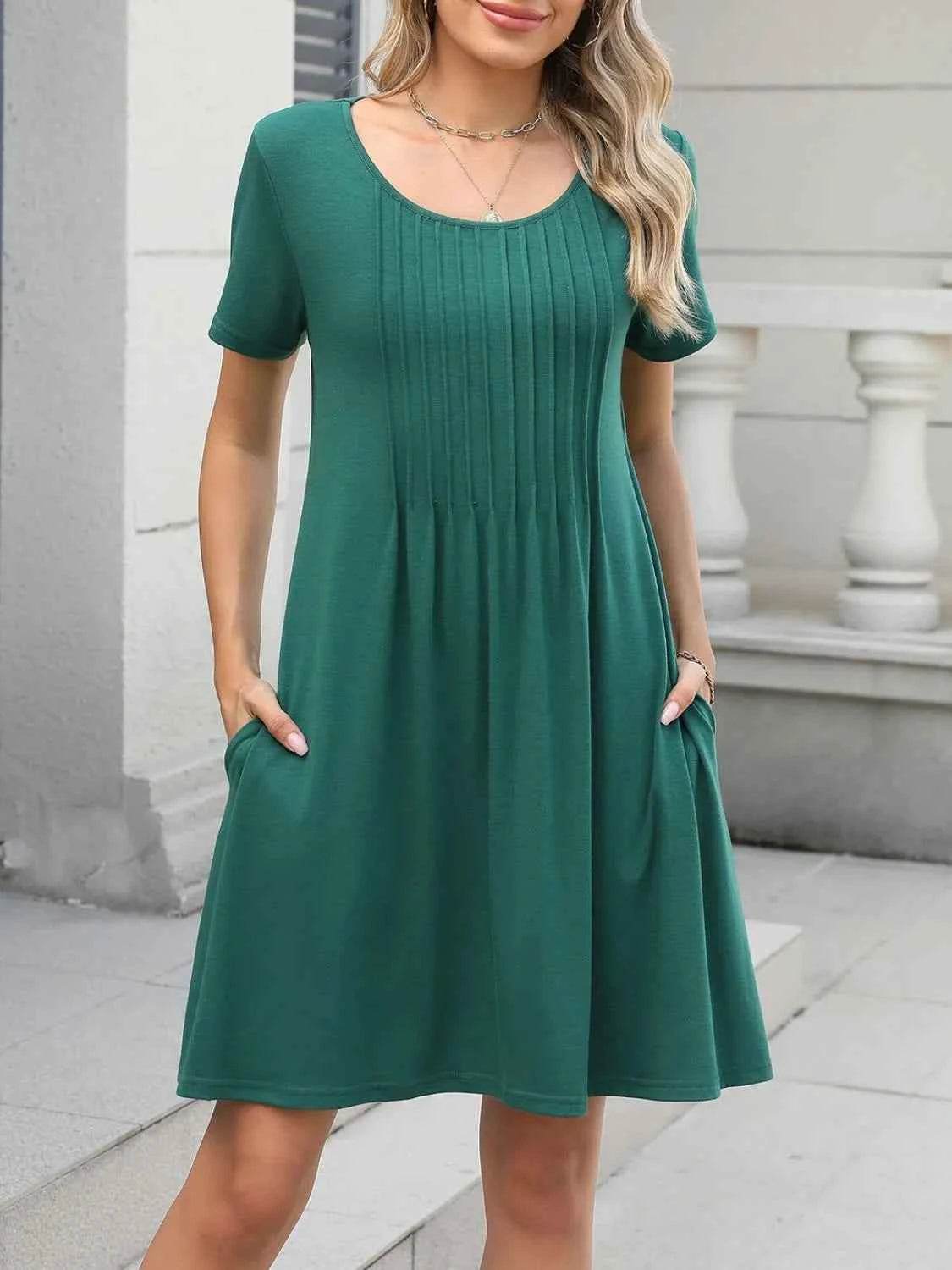 Pleated Front Round Neck Swing Dress.
