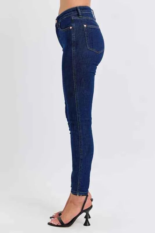 Judy Blue Plus Size Mid Rise Tummy Control Skinny Jeans.