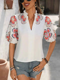 Floral Print Notched Puff Sleeve Blouse.