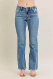 Judy Blue Plus Size Mid Rise Bootcut Jeans with Destroyed Hem.