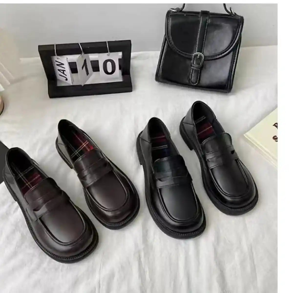Round Toe Leather Loafers.