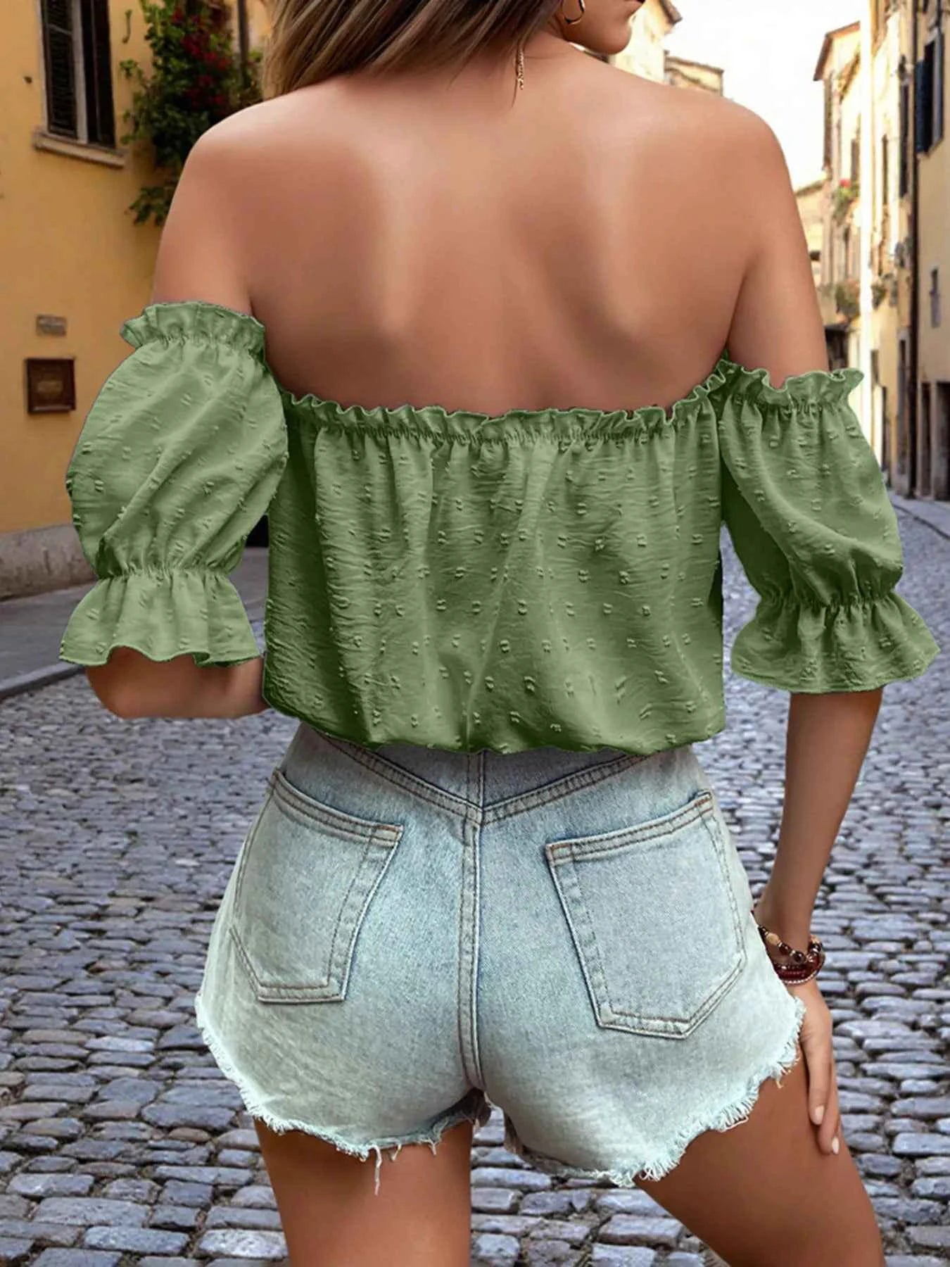 Off-Shoulder Swiss Dot Blouse with Tie Front.