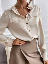 Button Down Long Sleeve Shirt with Chest Pockets.
