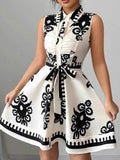 Printed Sleeveless Tie Waist Mini Dress.