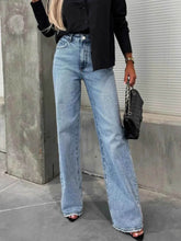 High-Waist Raw Hem Stretch Jeans.