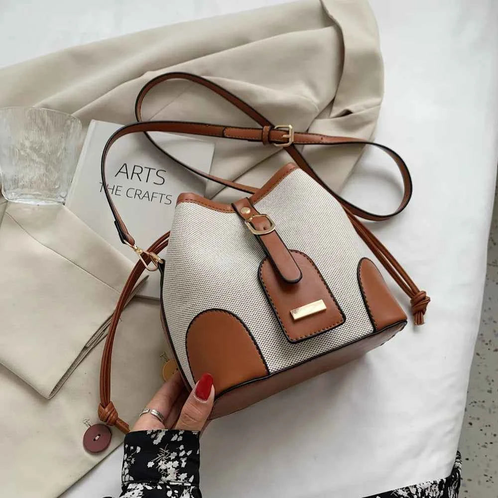 Straw Braided Adjustable Strap Crossbody Bag.