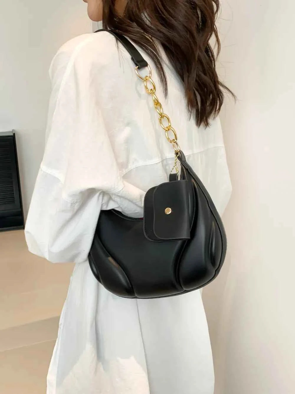 PU Leather Medium Shoulder Bag with EarPods Compartment.