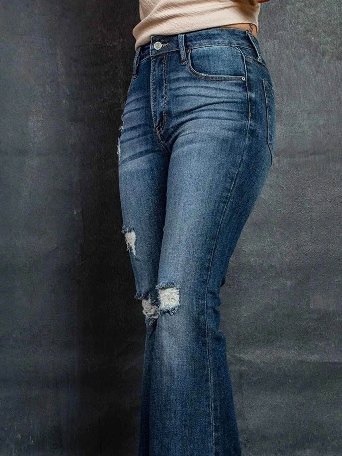 Distressed High-Waisted Flare Jeans.
