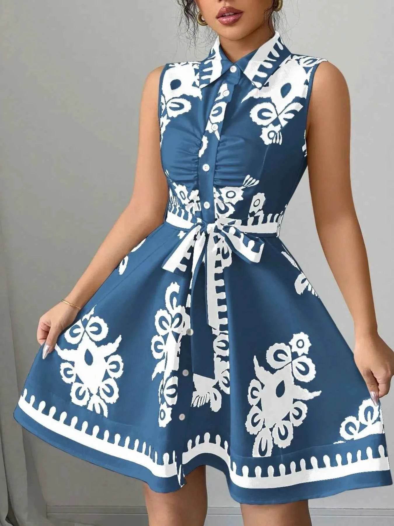 Printed Sleeveless Tie Waist Mini Dress.