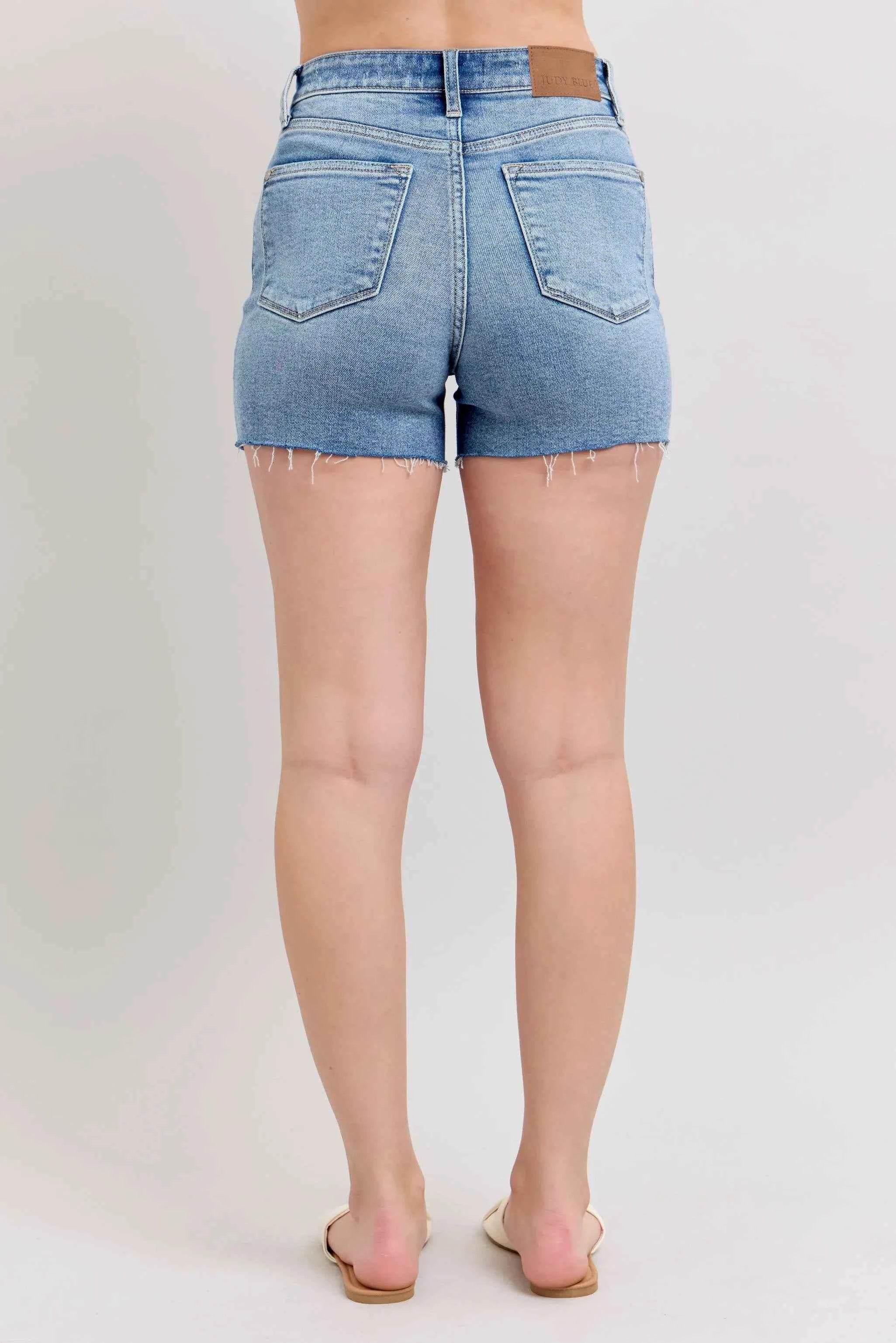 Judy Blue Plus Size High Waist Distressed Denim Shorts.