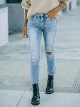 Distressed High Waist Jeans.