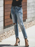 Distressed Button-Fly Skinny Jeans.