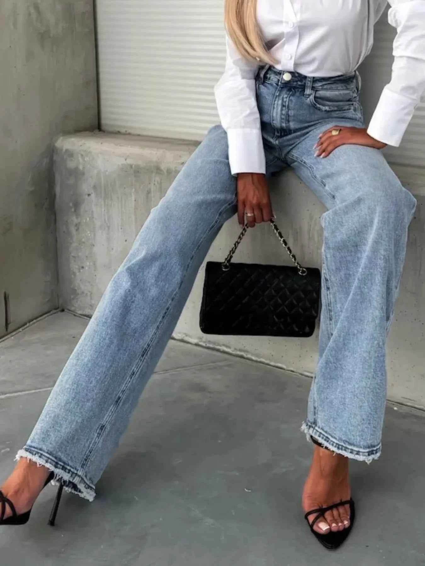 High-Waist Raw Hem Stretch Jeans.
