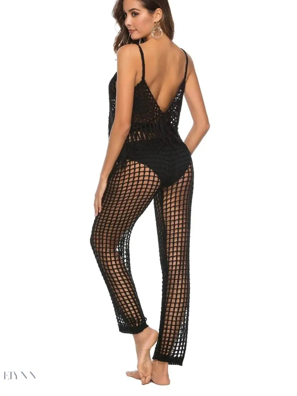 Black mesh cover-up showcasing cutout high waist swim pants for stylish beach looks