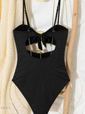 Cutout sweetheart one-piece swimsuit in black with bow detail and adjustable straps