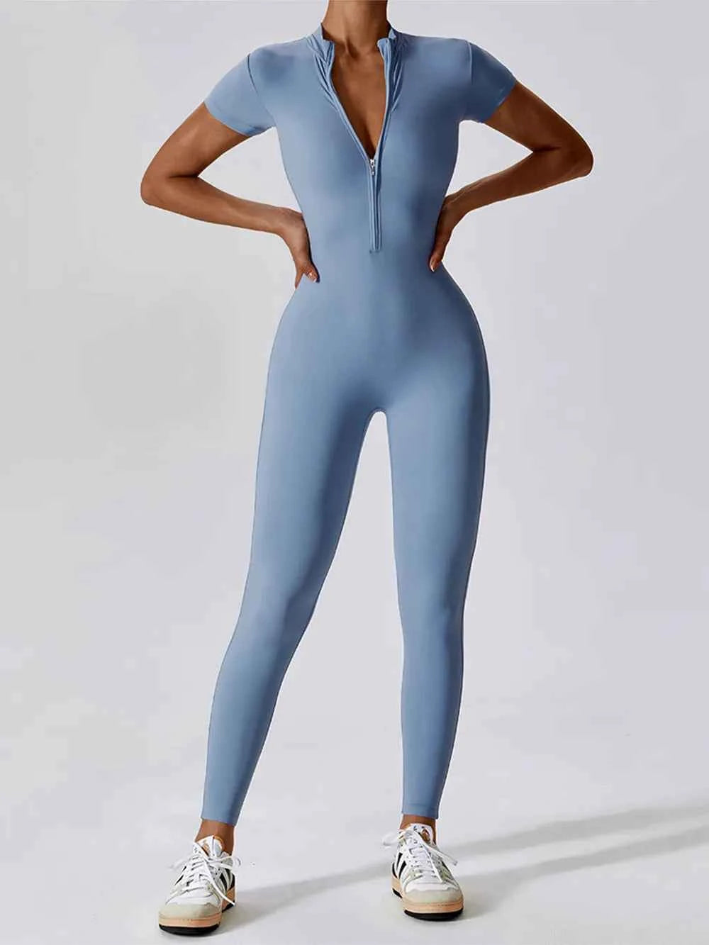 Basic Bae Half Zip Short Sleeve Active Jumpsuit.