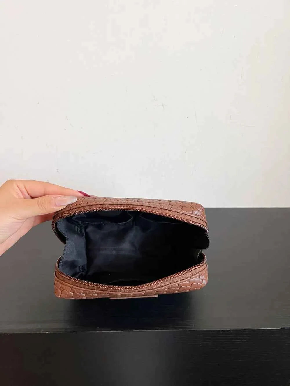 PU Leather Woven Clutch Bag.