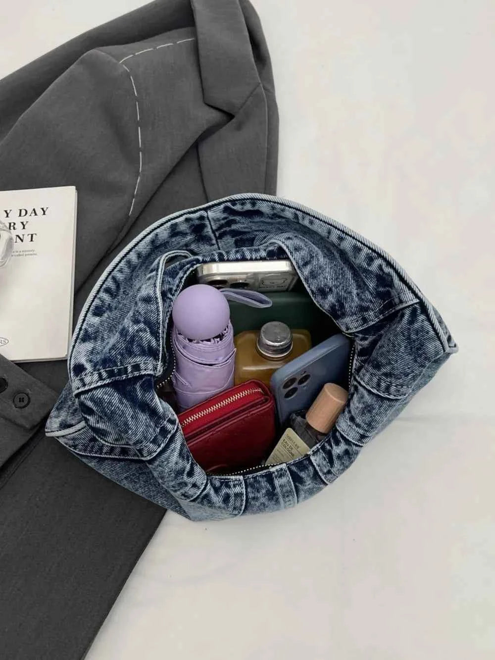 Crescent Shaped Denim Shoulder Bag.