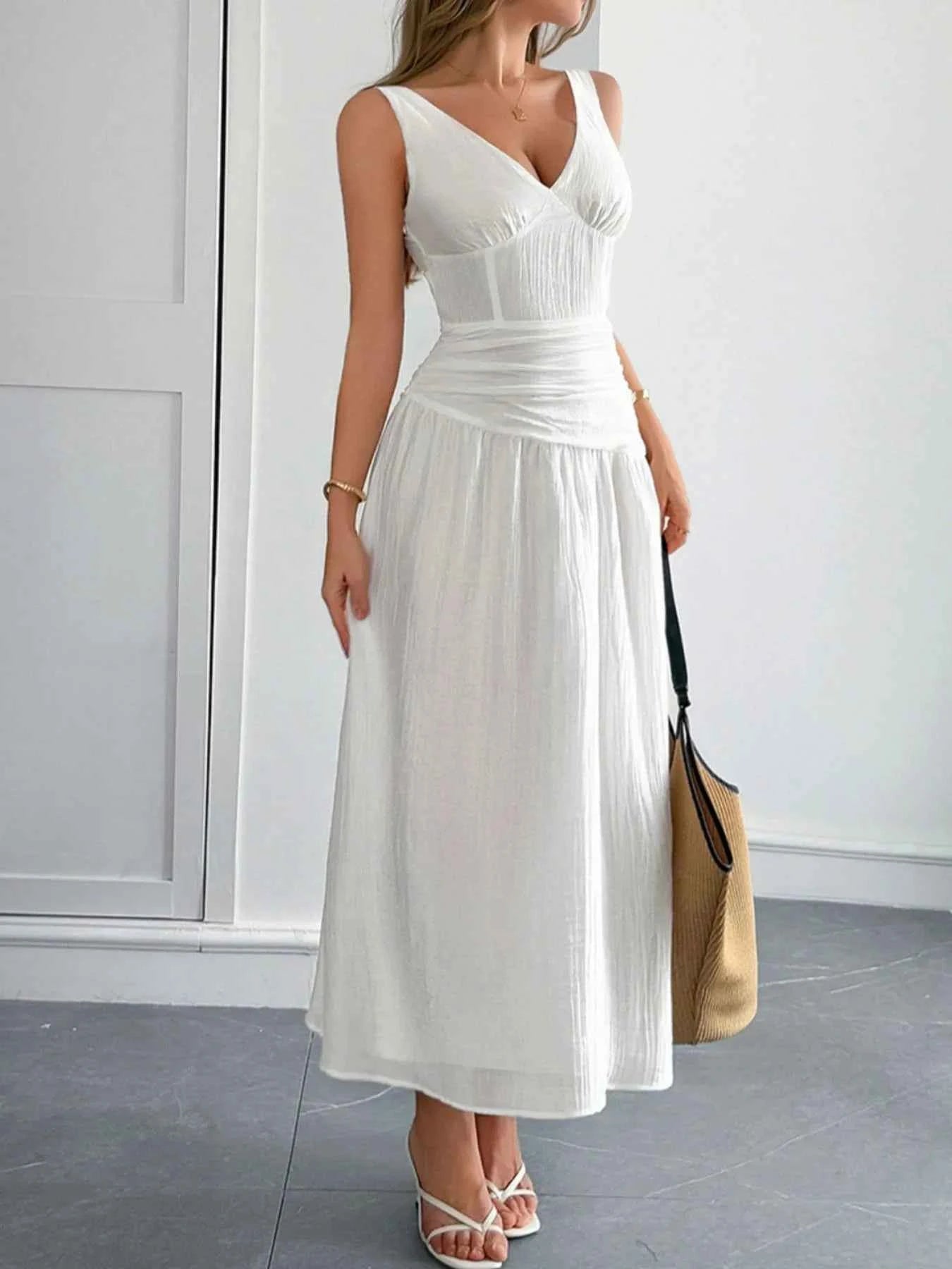 Cutout V-Neck Sleeveless Midi Dress.