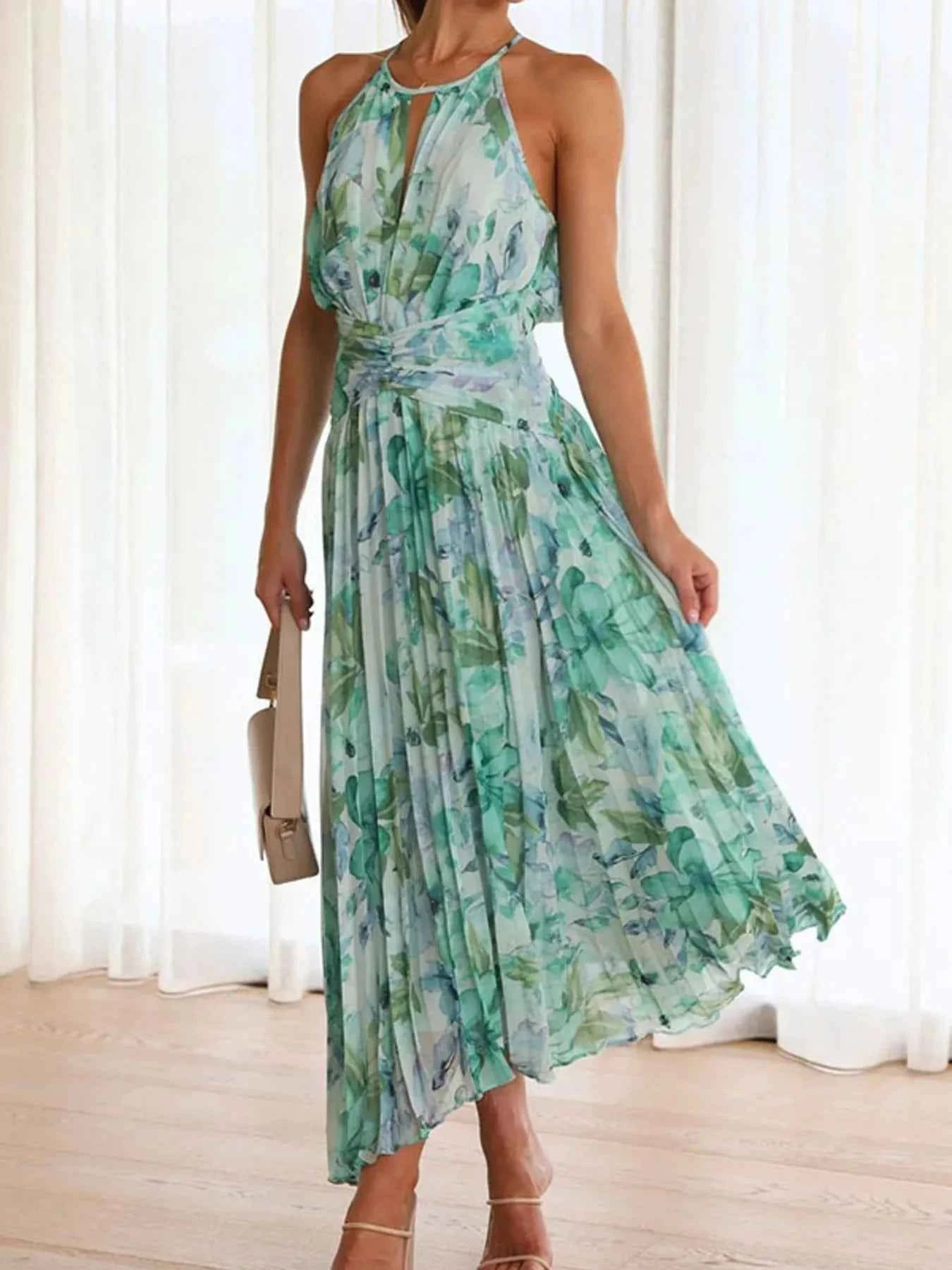 Printed Sleeveless Pleated Dress.
