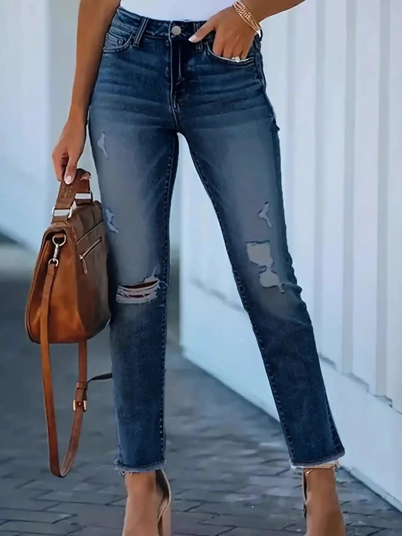 Distressed High-Waisted Skinny Jeans.