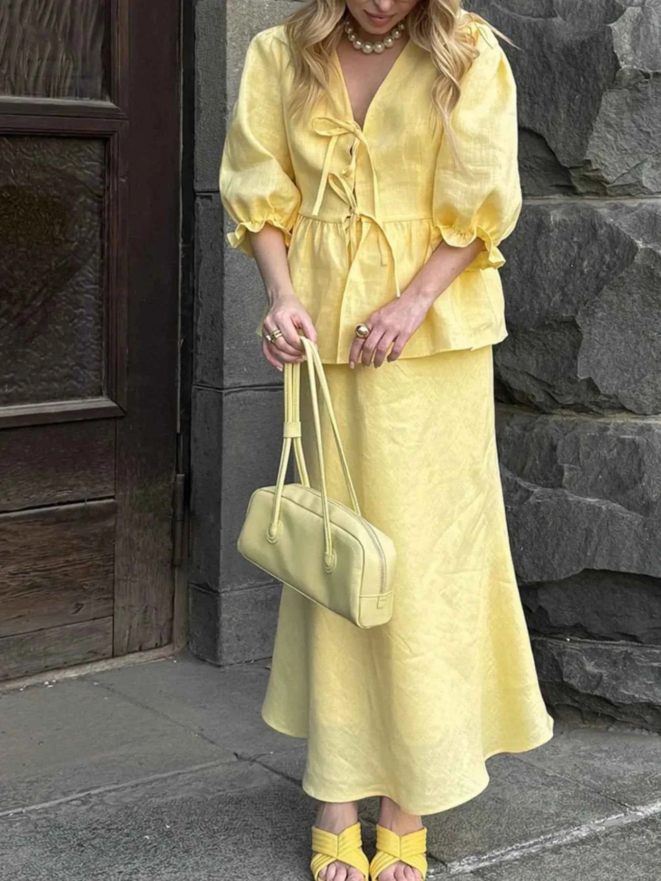 Lace-Up Tie Front Peplum Top and Skirt Set.