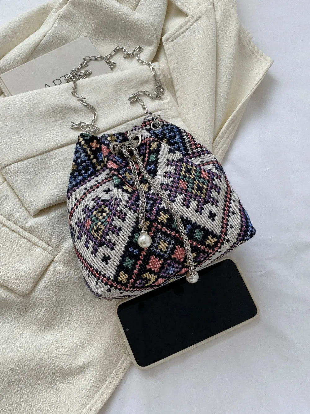 Printed Chain Bucket Bag.