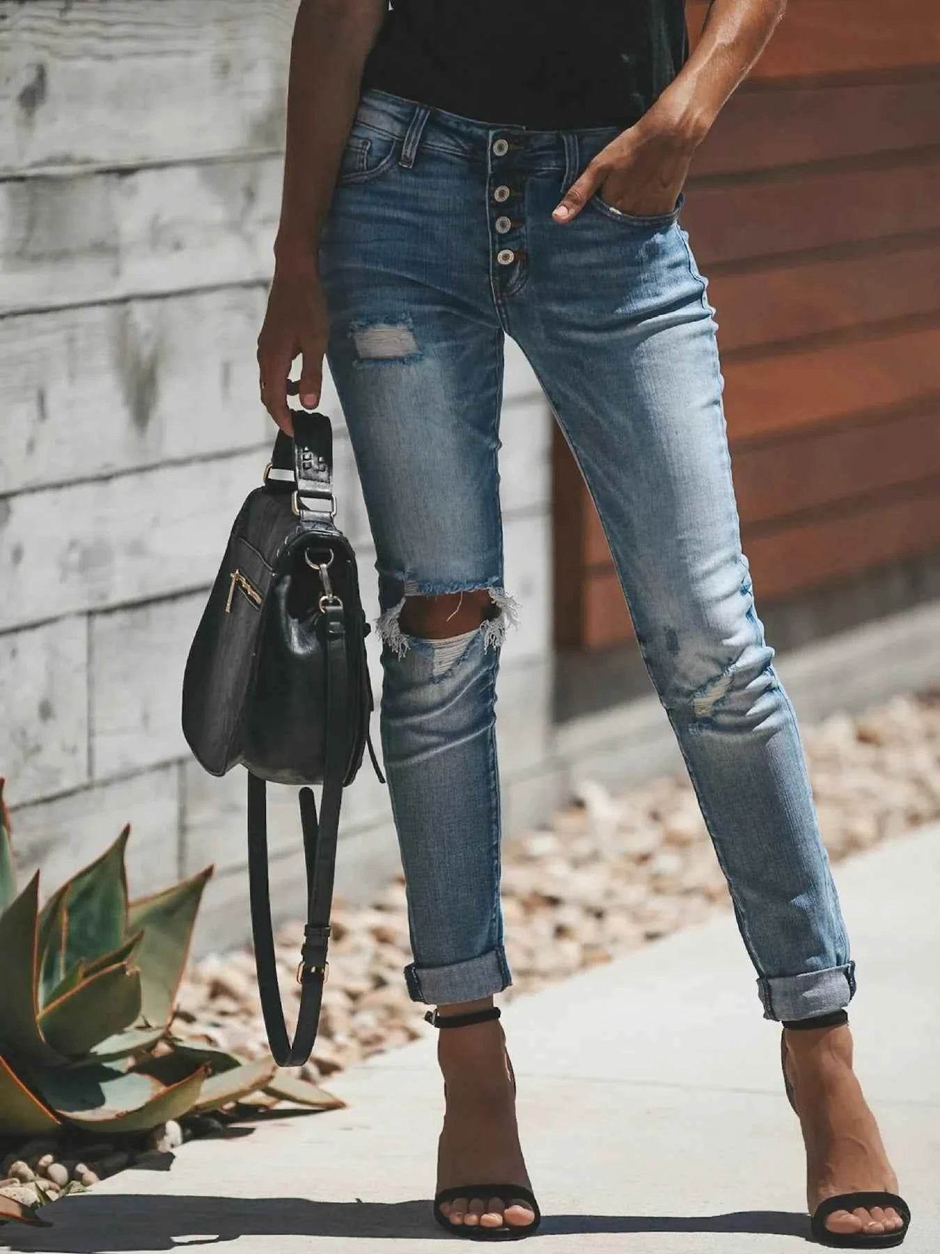 Distressed Button-Fly Skinny Jeans.