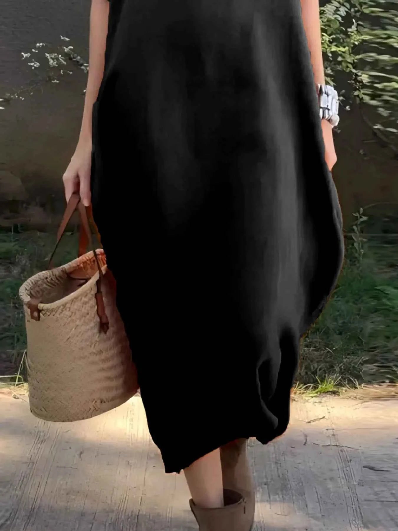 Plus Size Casual Loose Fit Round Neck Midi Dress.