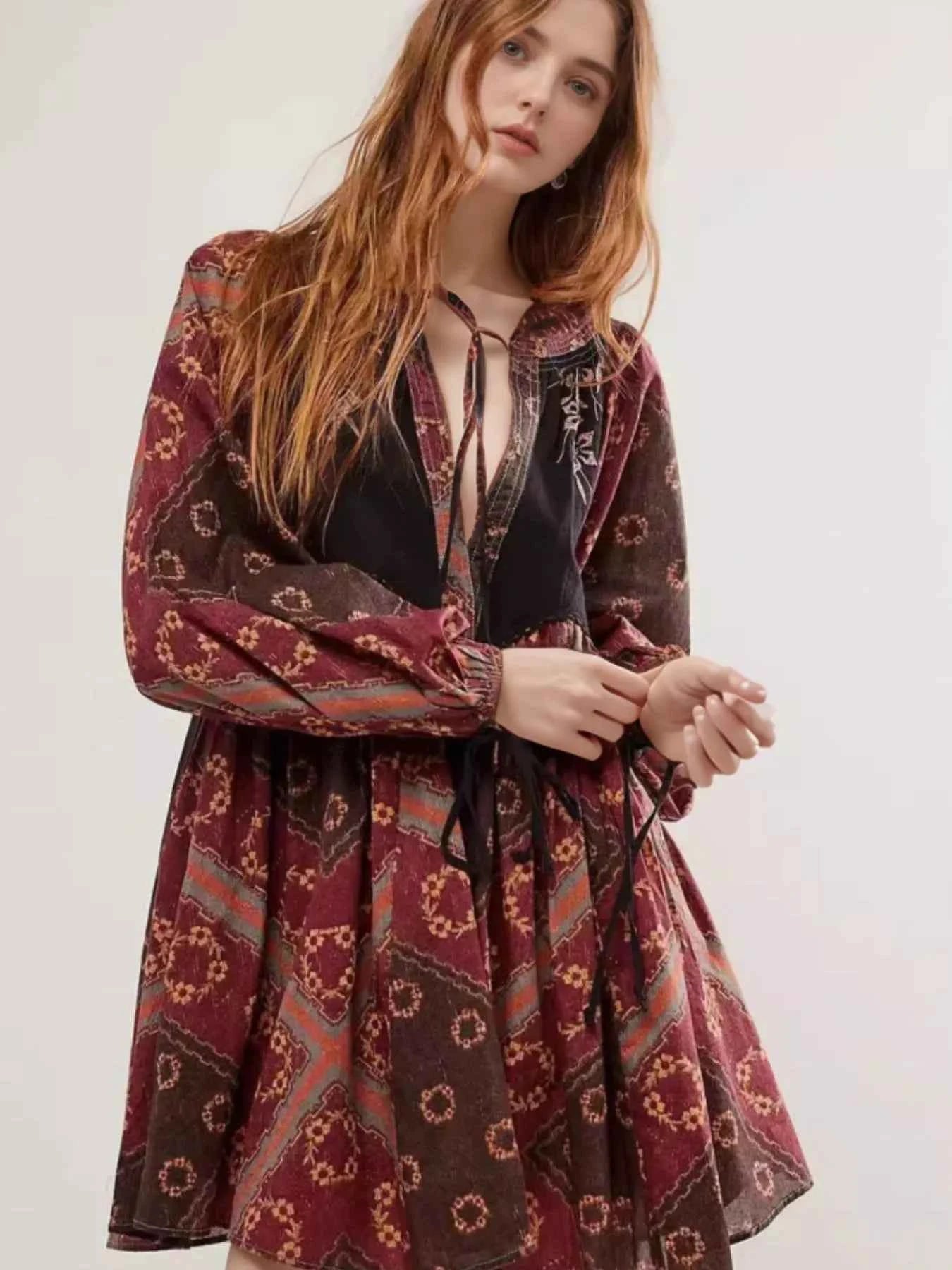 Printed Tie Neck Long Sleeve Dress.