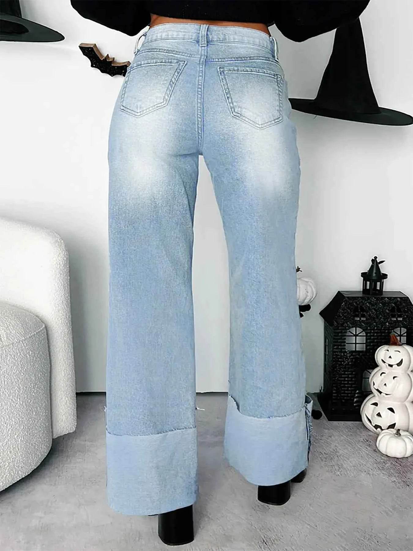 High-Waisted Wide-Leg Jeans with Cuffed Hem.